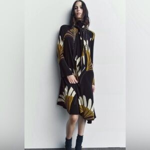 NWOT ZARA WOMAN COLLECTION Printed Asymmetric Dress in black and gold. Size M.